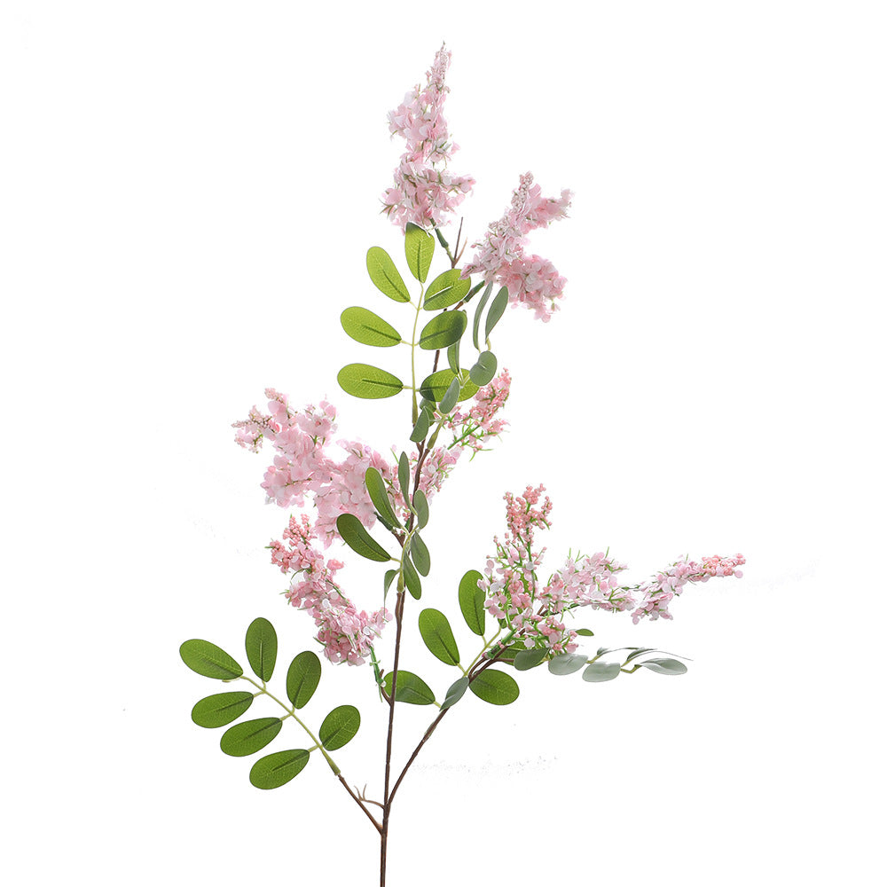 Artificial flower branch with vibrant purple flowers