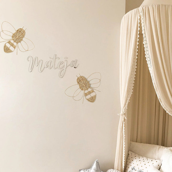 Decorative wall hanging in bee design