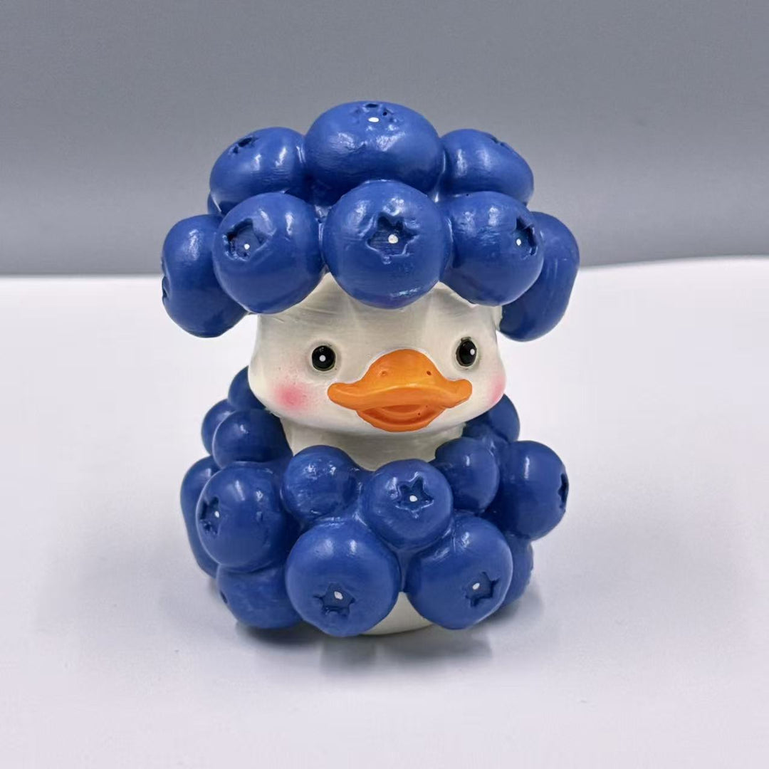 Decorative rubber duck with berry cocktail bowl