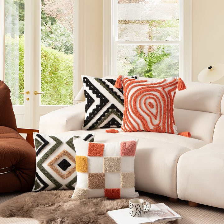 Decorative pillow with textured square appliqués and cotton cover