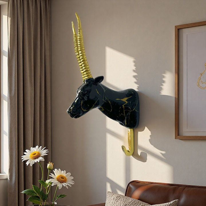 Wall hook in the form of a stylized unicorn