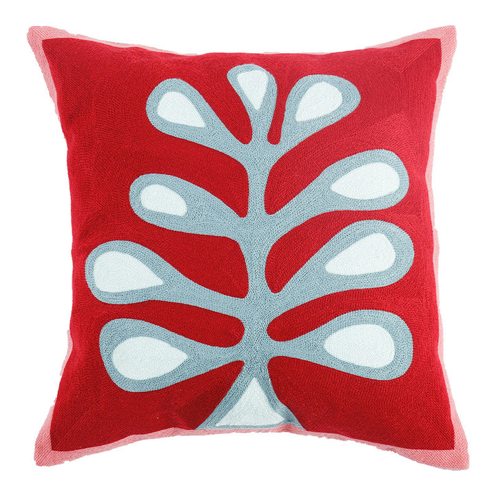 Square cushion cover in graphic geometric relief with decorative tassels