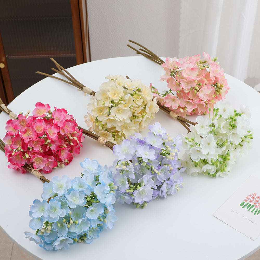 Artificial flower bouquet with delicate blooms