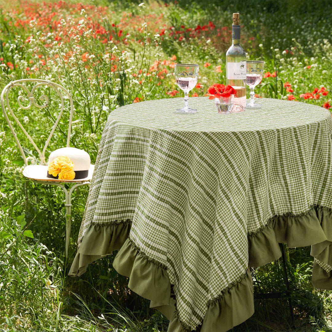 Rustic country house tablecloth made of cotton blend fabric with fine check pattern and ruffled hem