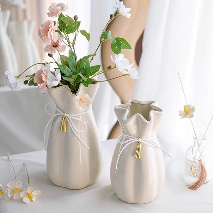 Elegant ceramic vase with delicate ruffled edge