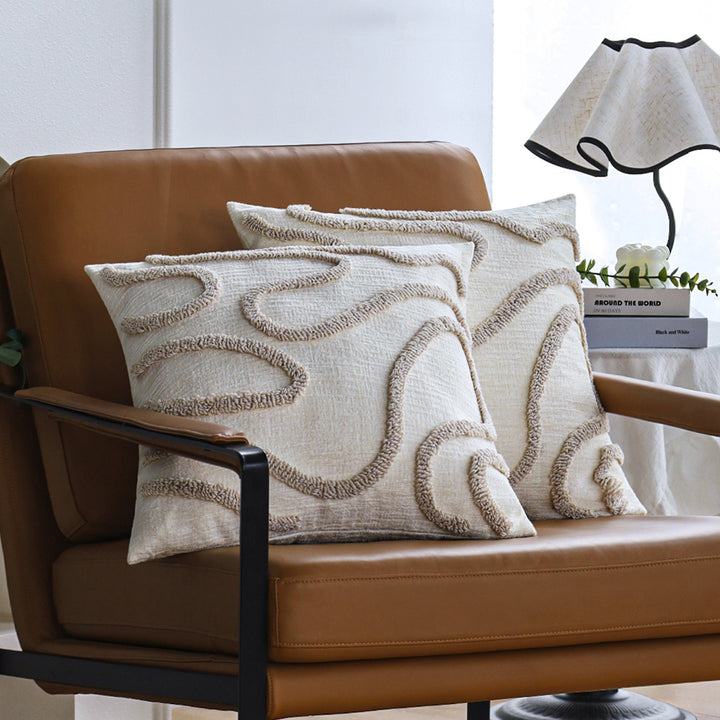 Square decorative cushion cover with hand-tufted loop appliqué and fine linen look