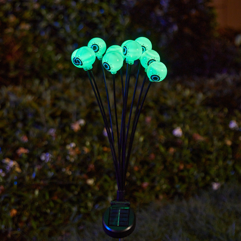 Creepy garden lights with eye motif