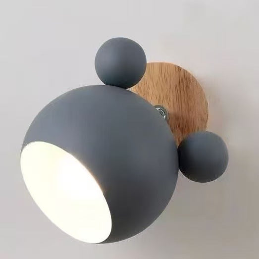 Children's decorative wall lamp with wooden background and bear ears