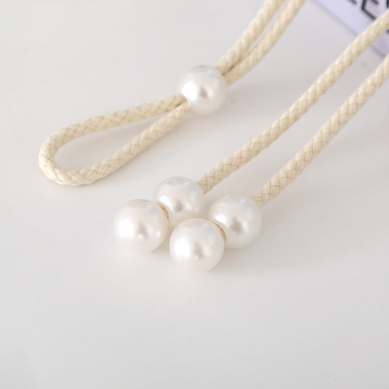 Elegant curtain tieback with pearl trim
