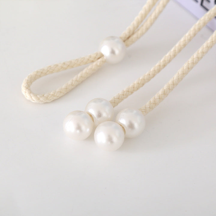 Elegant curtain tieback with pearl trim