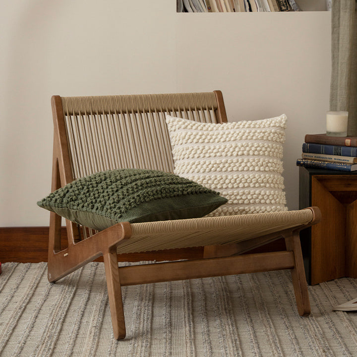 Structured knitted cushion with bobble look
