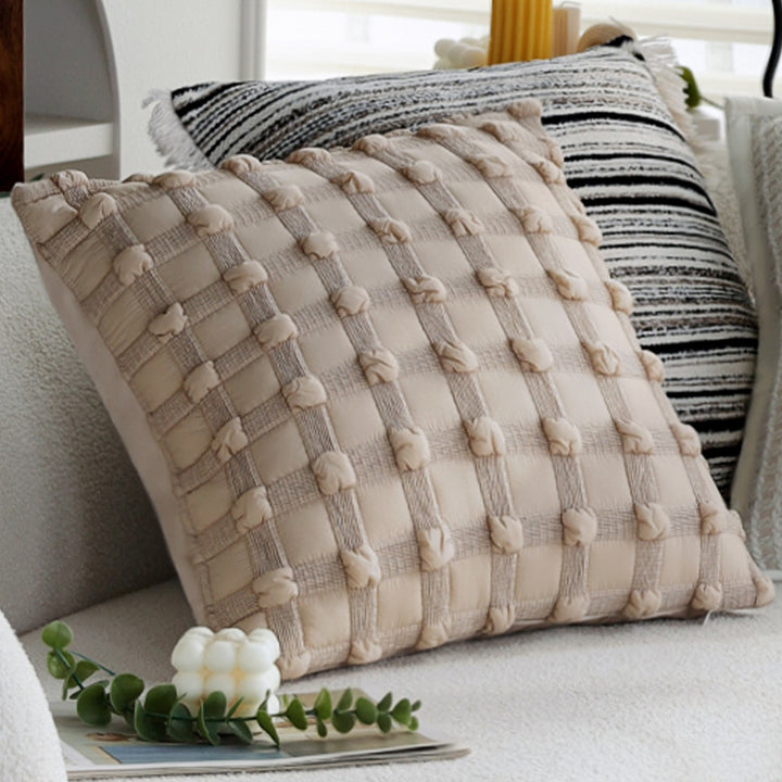 Woven home decor pillow cover with fine striped texture and hand-fringed edge