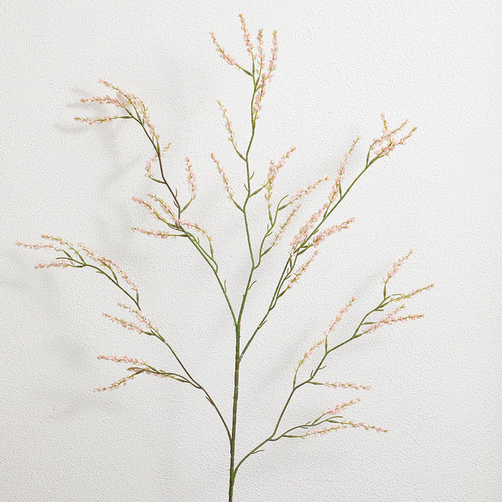 Artificial flower branch with fine pink flowers