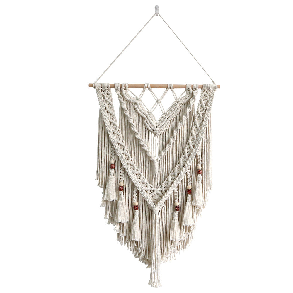 Hand-woven macrame wall hanging with decorative tassels
