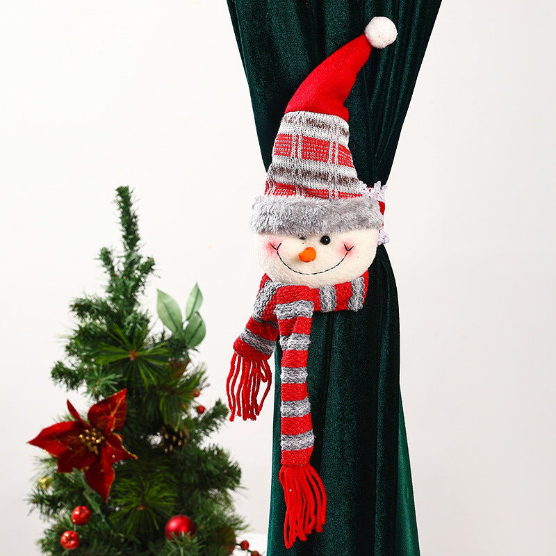 Decorative curtain holder with Christmas moose motif