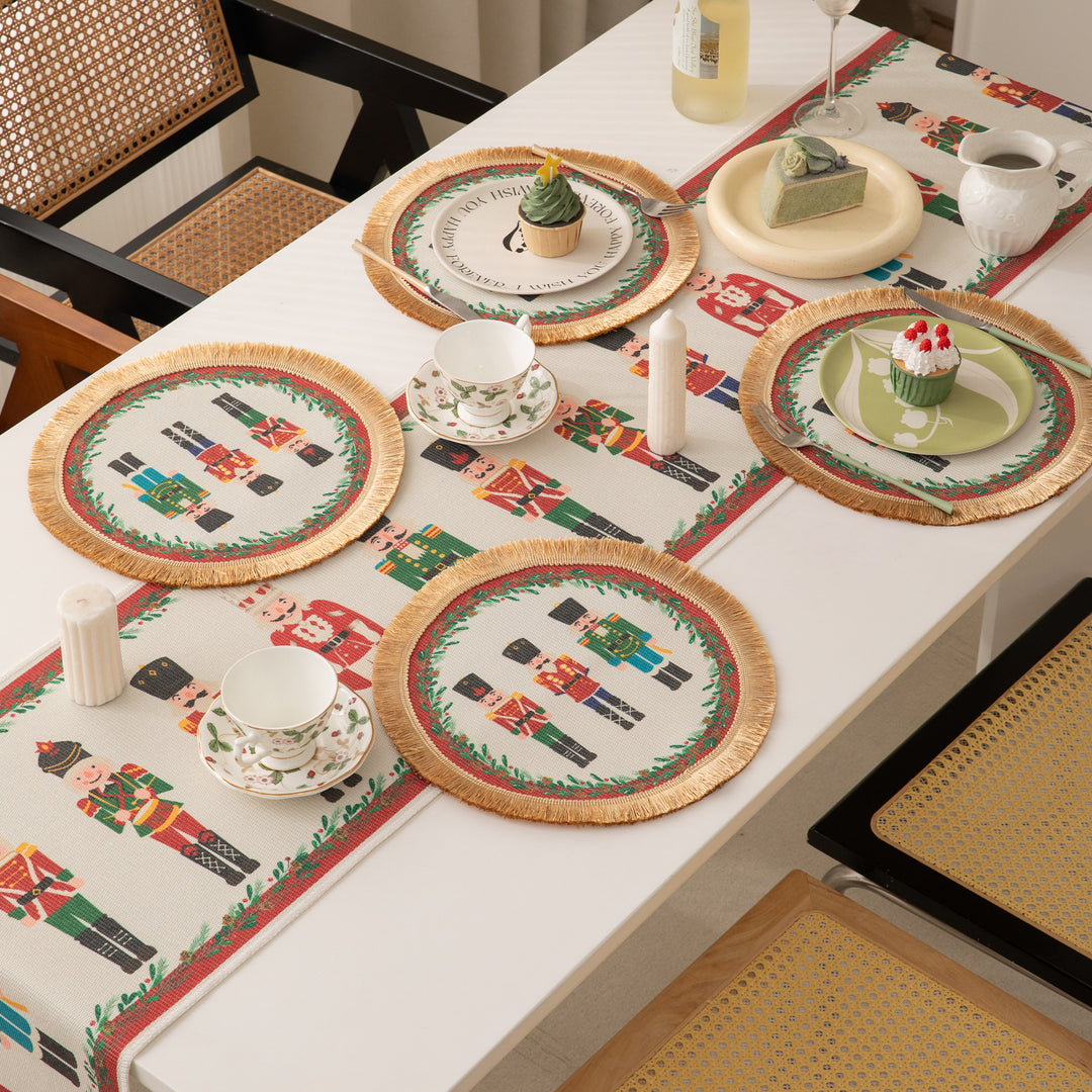 Festive woven table runner with nutcracker motif and golden fringes