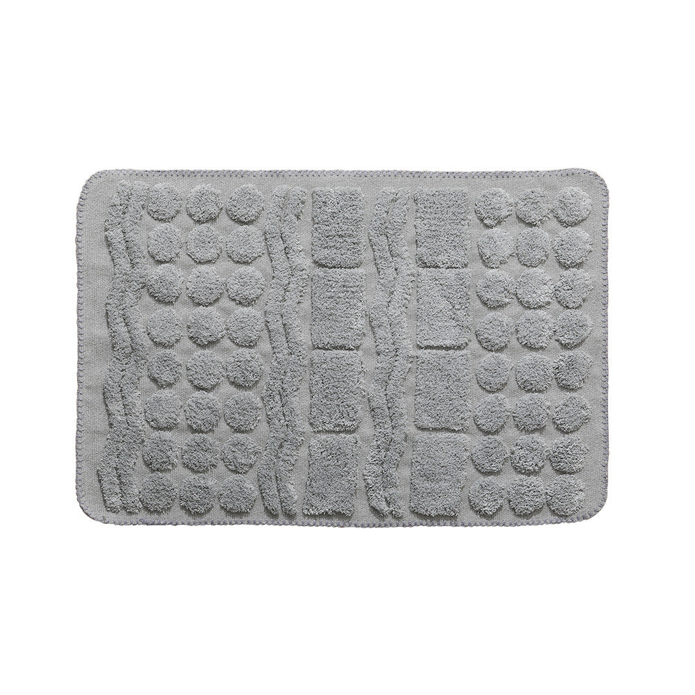Luxurious organic cotton bath mat with relief pile structure