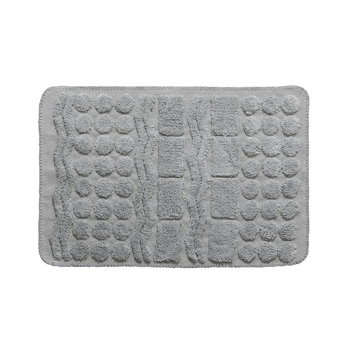Luxurious organic cotton bath mat with relief pile structure
