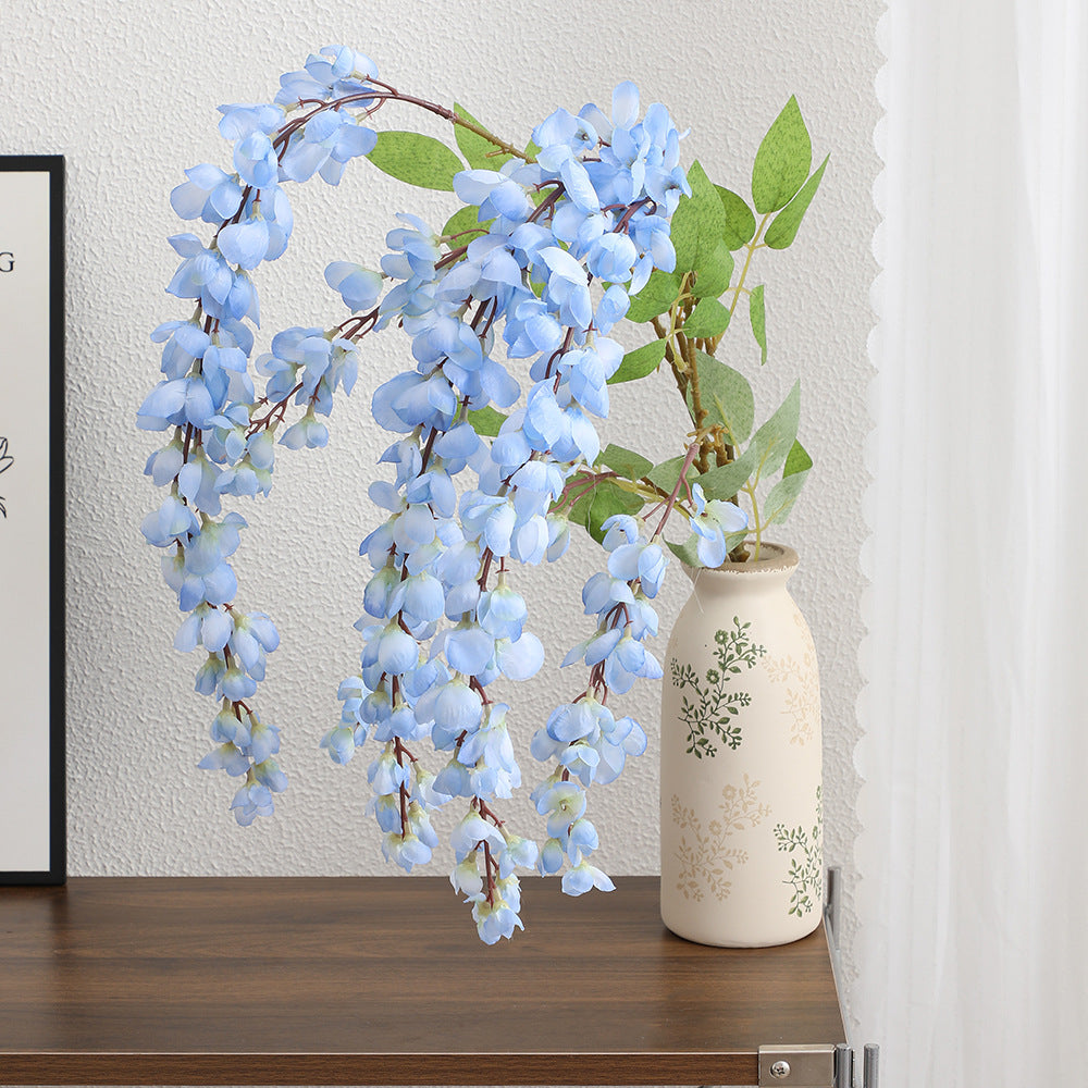 Artificial flower branch with elegant flowers