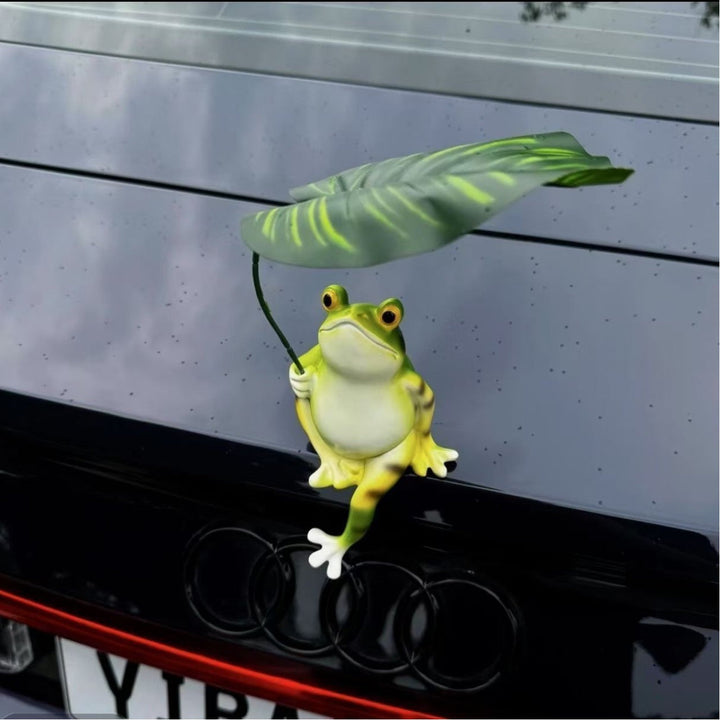 Funny frog figure with umbrella