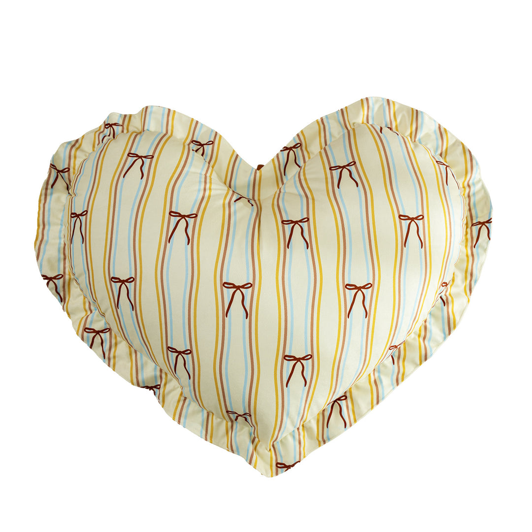 Heart-shaped decorative pillow with ruffled edge and heart pattern