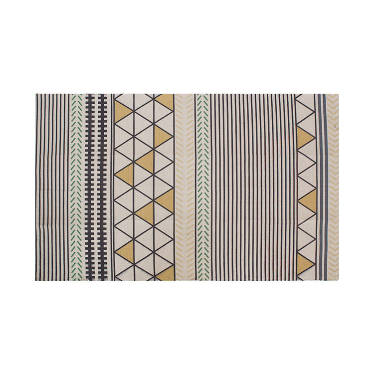 Flat-woven rectangular rug for living and entrance areas with quatrefoil pattern