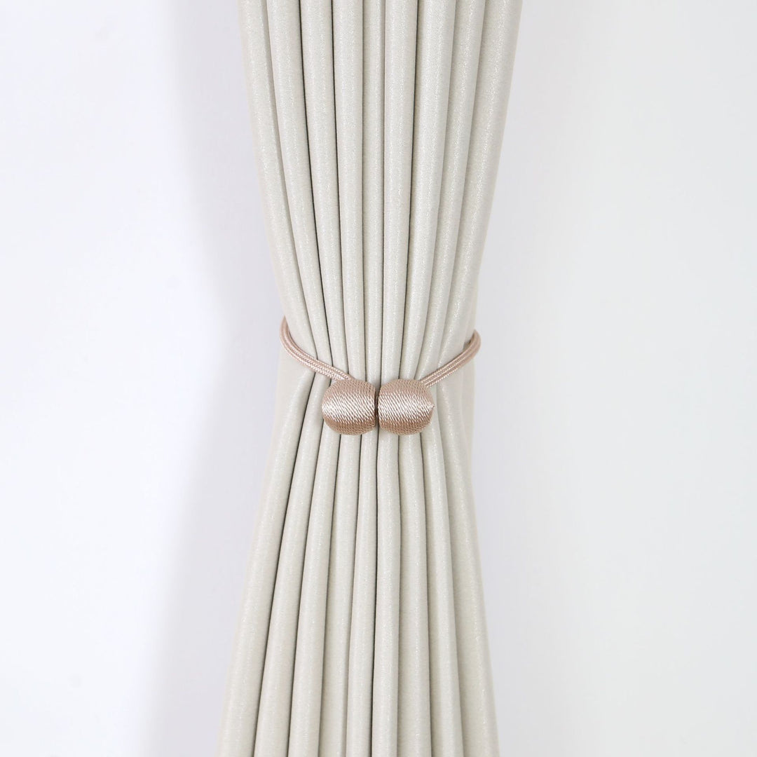 Decorative curtain tieback