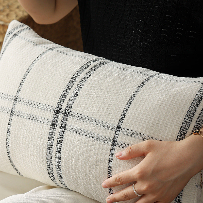 Rectangular woven cushion cover with checkered texture pattern and concealed zipper