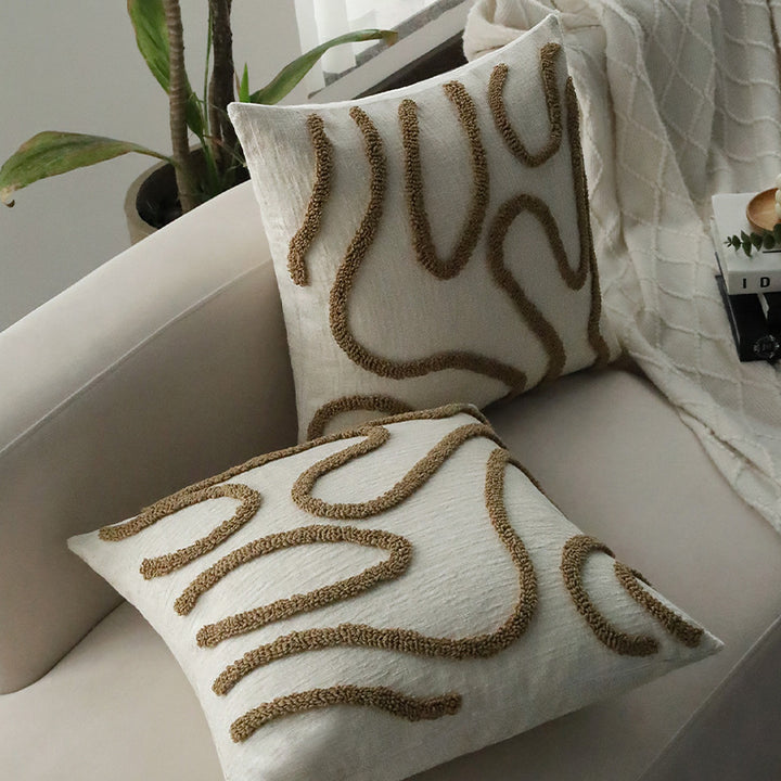 Square decorative cushion cover with hand-tufted loop appliqué and fine linen look
