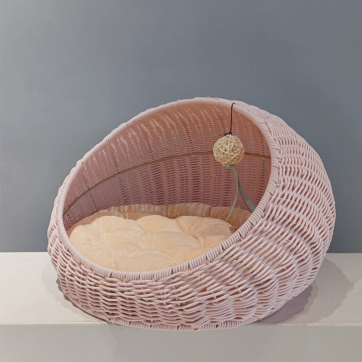 Cozy cat bed made of woven natural material