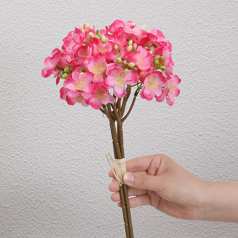 Artificial flower bouquet with delicate blooms