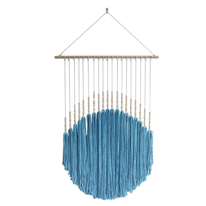 Decorative wall art with wooden beads and thread pendulum