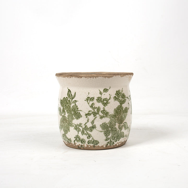 Decorative ceramic plant container with artistic design