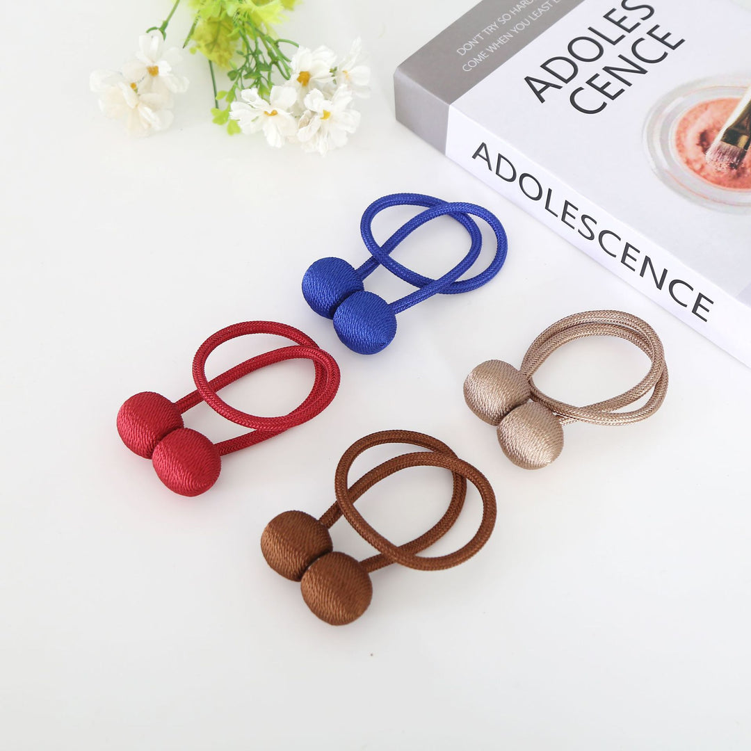 Decorative curtain tieback