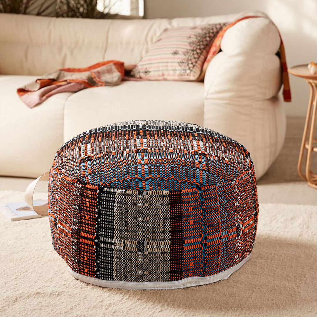 Round woven seat pouf made of durable cotton mix with practical carrying handle