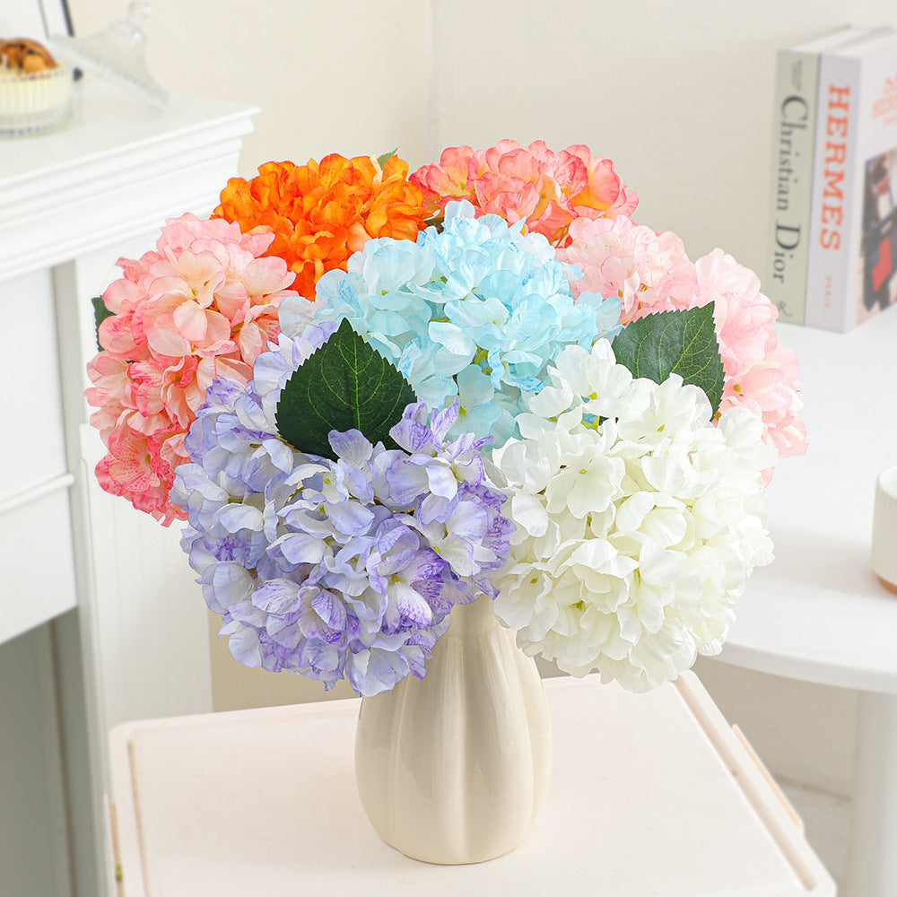 Artificial flower branch with realistic flowers