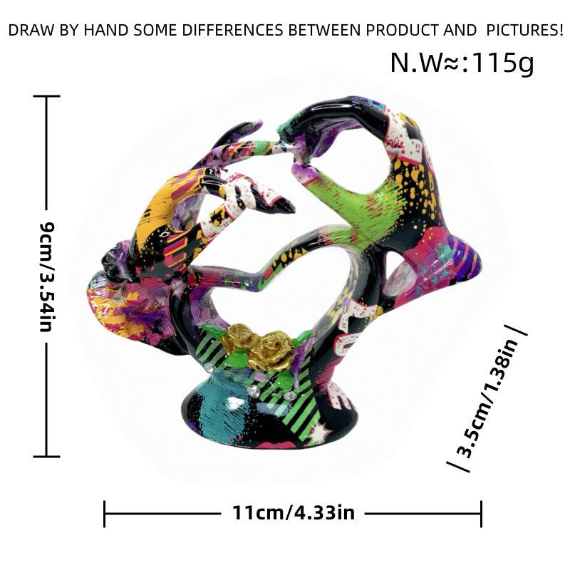 Artistic heart sculpture with detailed painting