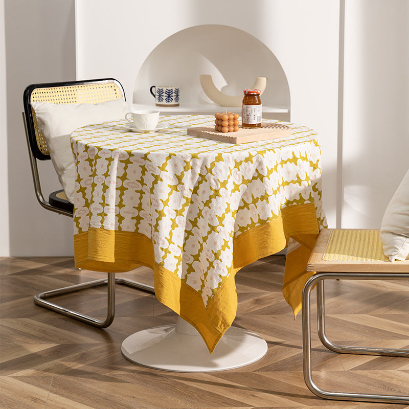 Rectangular printed tablecloth with wide hem and geometric pattern