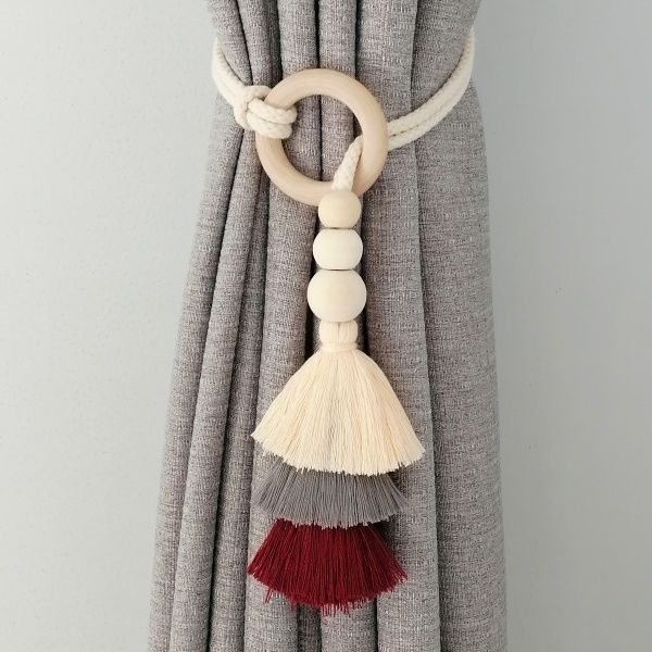 Decorative curtain holder with tassels