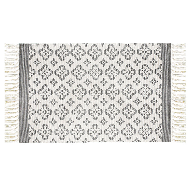 Flat-woven cotton runner with Mediterranean tile jacquard and decorative fringes