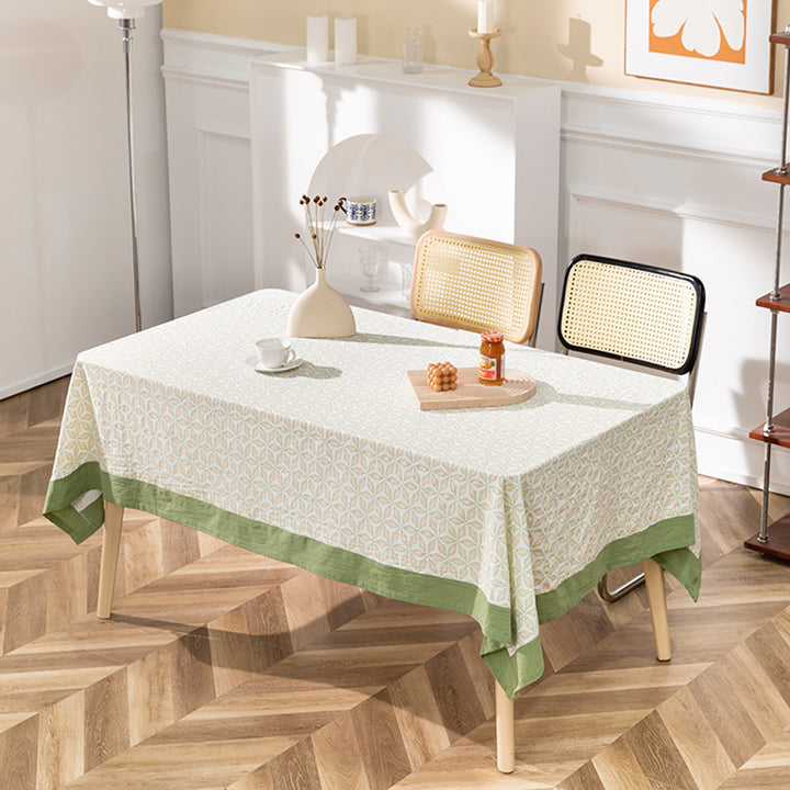 Cotton tablecloth with graphic all-over pattern and contrasting hem edge