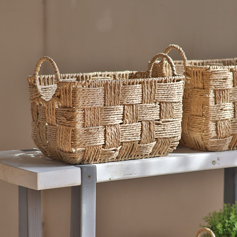 Handmade storage basket with practical handle