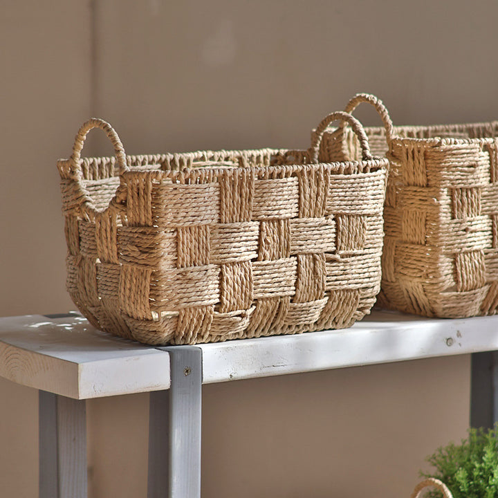 Handmade storage basket with practical handle