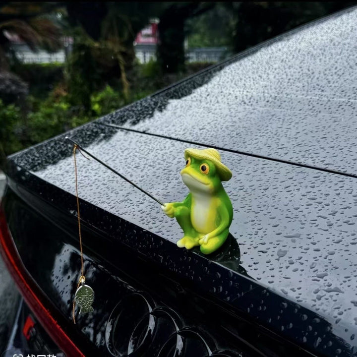 Funny frog figure with umbrella