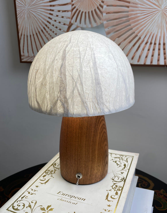 Artistic table lamp with natural wood base