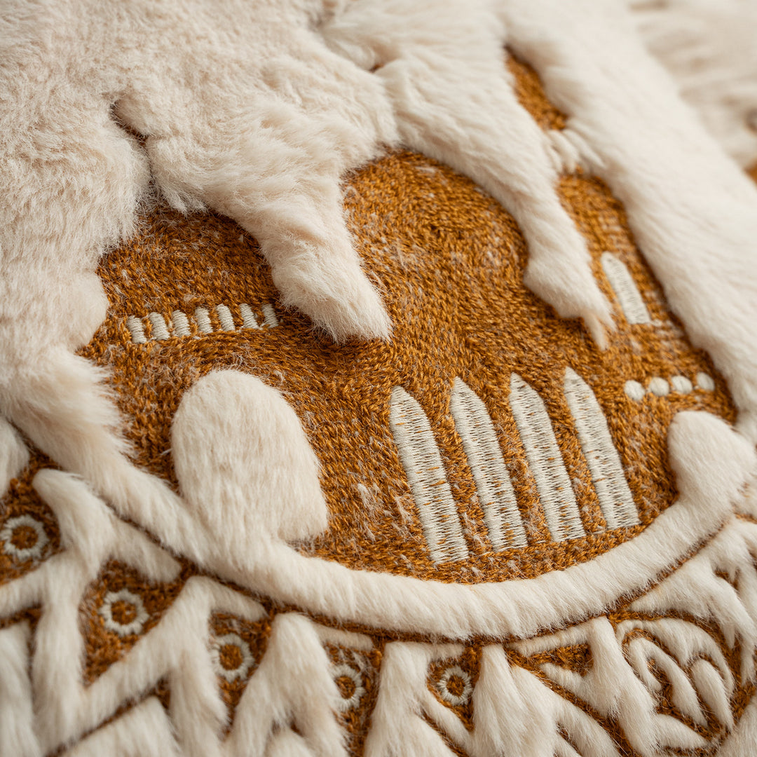 Square cushions made of micro plush with embossed mandala relief and concealed zipper