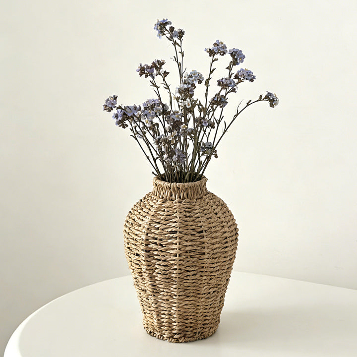 Decorative basket vase made of woven natural material