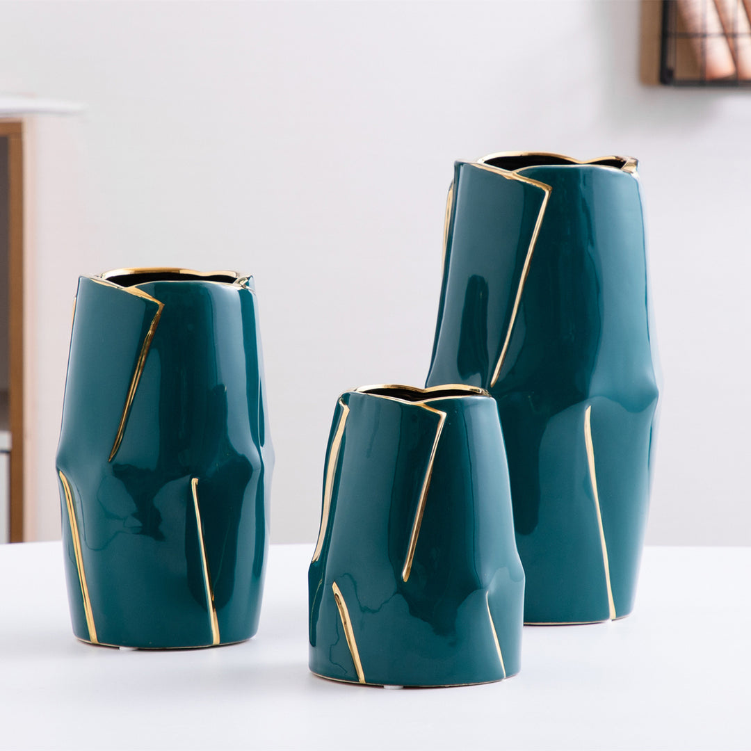Decorative ceramic vase with golden accents
