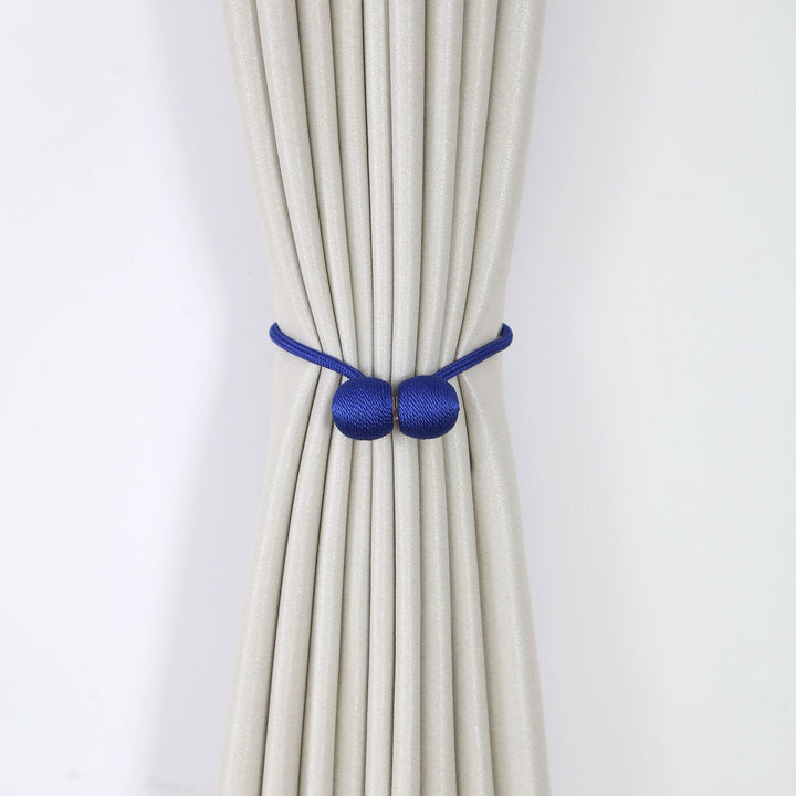 Decorative curtain tieback