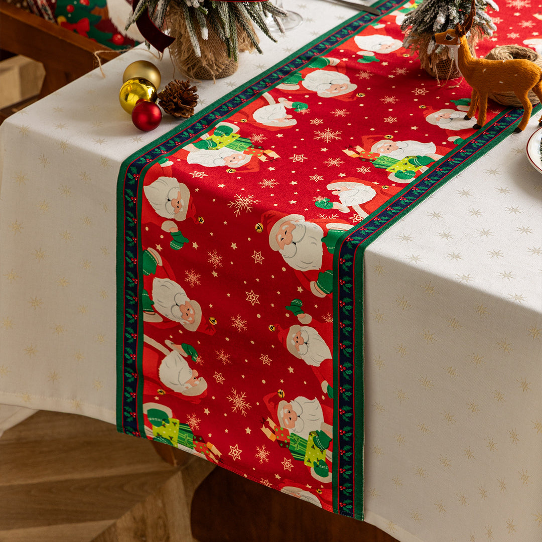 Table runner made of cotton blend fabric with a Christmas reindeer and star motif